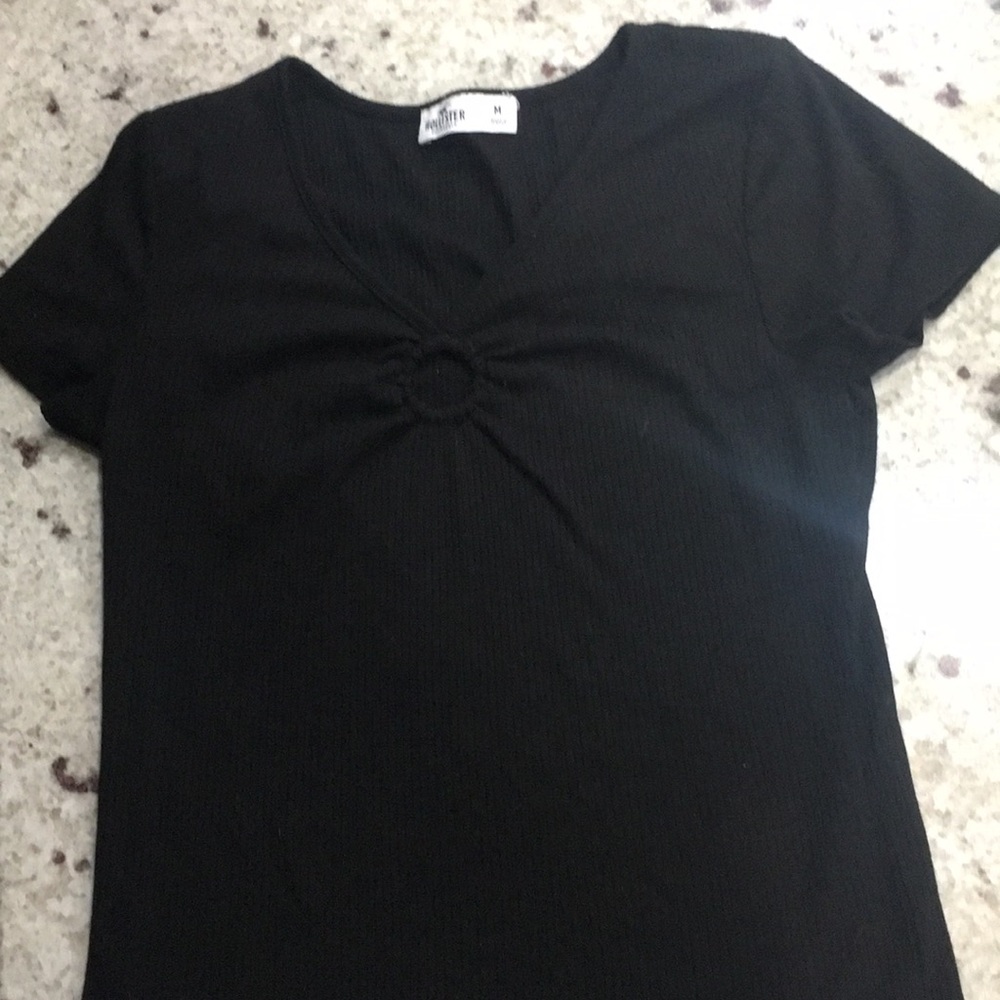 A tight black crop top from hollister